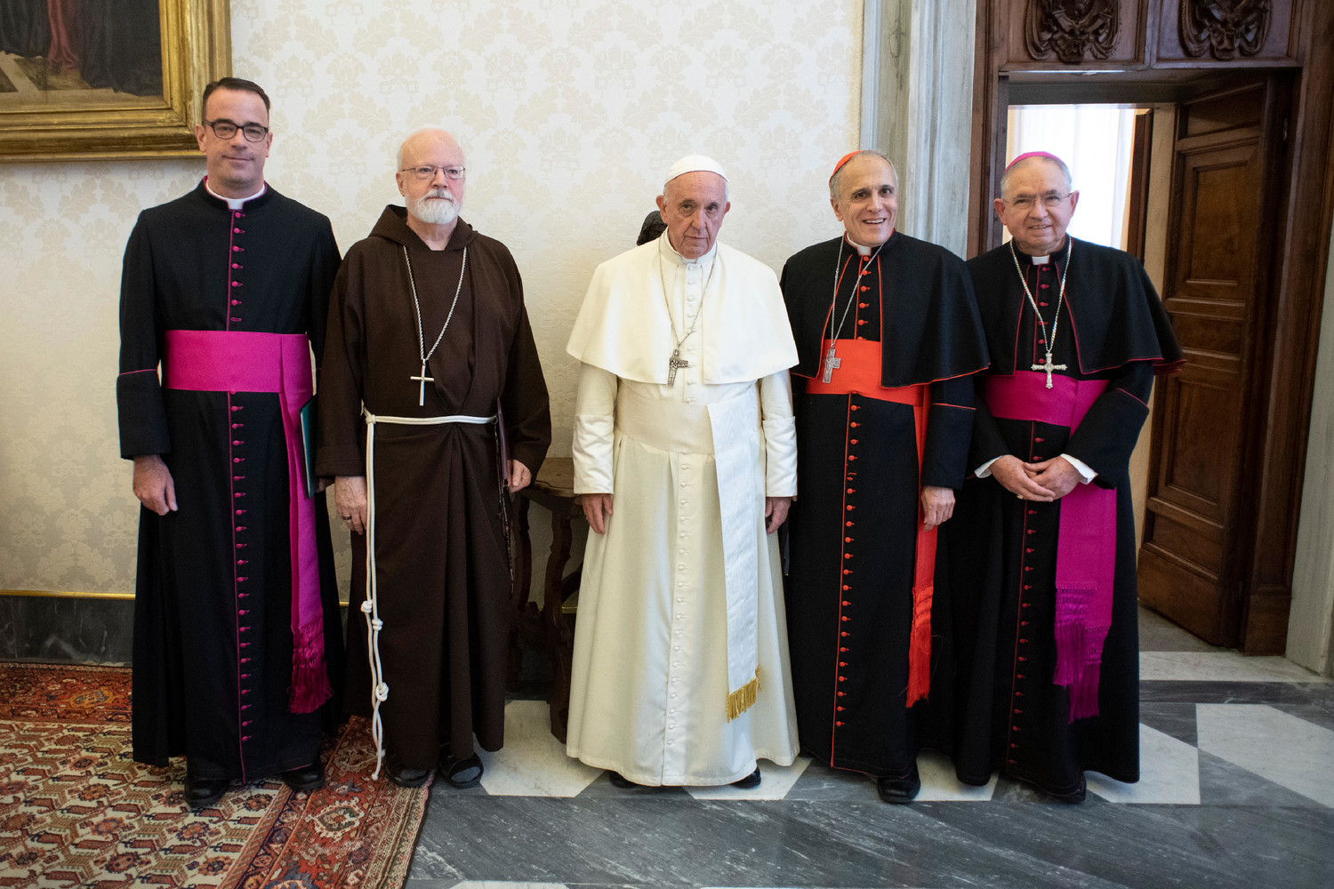 Pope Francis poses with officials representing the U.S. Conference of Catholic Bishops during a meeting at the Vatican Sept. 13. Pictured from left are Msgr. J. Brian Bransfield, general secretary of the conference, Cardinal Sean P. O’Malley of Boston, president of the Pontifical Commission for the Protection of Minors, Cardinal Daniel N. DiNardo of Galveston-Houston, president of the conference, and Archbishop Jose H. Gomez of Los Angeles, vice president of the conference.
